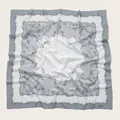 Detailed view of floral pattern and wavy cut edges on white and grey square hijab scarf. - 110X110CM / Grey White Geometric Floral (Bo110cm-14#)