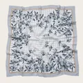 Detail view of the square voile scarf showing elegant floral prints and wave-cut edges. - 110X110CM / Blue and White Floral (Bo110cm-22#)