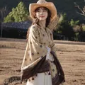 Vintage Maillard style printed shawl with tassels worn by a model in autumn field - 180cm / Old Money Geometric