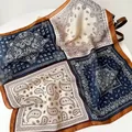 Detail shot showing intricate paisley pattern on a vintage style silk scarf accessory - RZ6539-Blue