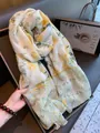 Detailed view of a yellow floral ethnic style shawl with elegant yellow tassel fringe. - 180cm / Small Yellow Flower