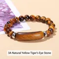 Natural yellow tiger eye stone bracelet featuring cylindrical and round beads design. - 8mm Beads 10*39mm Tube / 3A Natural Yellow Tiger Eye