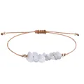 Bohemian handmade bracelet with irregular white natural stones on a brown waxed cord. - Moonstone