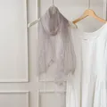 Detail of a sheer lavender scarf with fringe, showing its light and breathable texture. - 180cm / Light Purple