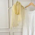 Detail view of a light yellow sheer scarf showing soft texture and delicate drape - 180cm / Light Yellow
