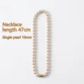 Elegante 10mm crème parelketting met 47cm lengte en minimalistische gouden sluiting - Crèmewitte parelketting / Lengte 47cm (Enkele Parel 10mm)