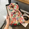 Thin summer silk scarf featuring a vibrant floral leaf print and colorful mini tassels - 180cm / Colorful Variegated Leaves