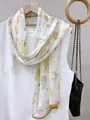Elegant floral print thin chiffon scarf featuring yellow and pink flowers on white base - Lilac Stone
