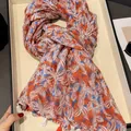 Elegant floral print lightweight scarf in orange and blue tones with white tassel details - 180cm / Colorful Orange Petals