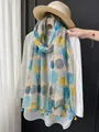 Lightweight fashion scarf with blue and yellow circle print and tassel fringe details - 180cm / Geometric Moon