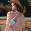Elegant pink floral sun protection shawl scarf with tassels worn by a model in sunset - 180cm / Crystal Pink Butterfly Flower