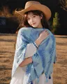 Elegant blue patterned cotton linen shawl for beach sun protection worn by a model - 180cm / Blue Leaf