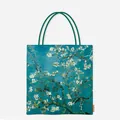 Detailed macro view of a canvas tote bag featuring Van Gogh's Almond Blossoms painting print. - Almond Blossom