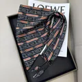 Elegant black silk triangle scarf with orange stripes and chain pattern detail - British Chain Equestrian Style (款式-62)