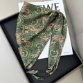 Elegant green paisley triangular waist scarf with delicate black beaded tie detail. - Dark Green Paisley with Beads (Style-50)