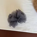 Detailed close-up of a black and white gingham mesh bow hair clip on a clean white fabric background. - Checkered Bow Banana Clip / Dark Blue