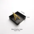 Modern black stainless steel napkin holder with gold feather weight - Black Feather Style
