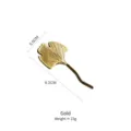 Elegant gold-finished ginkgo leaf stainless steel chopstick rest and spoon holder for dining - Gold