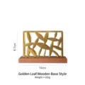 Serviettenhalter aus Metall mit goldenem Blattdekor und dunklem Holzsockel für Tische - Hohler Blatt Stil / Holzfuß / Gold