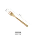 Vintage gold stainless steel dinner fork with leaf design and brushed metal finish - Dinner Fork