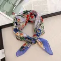 A close-up view of a floral print cotton linen square scarf with vibrant botanical patterns - 58cm / Purple Butterfly and Flowers