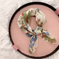Detail view of a vintage pastoral style floral cotton linen neck scarf with rabbit pattern - 58cm / Beige Cartoon Rabbit
