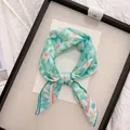 Detailed view of mint green floral cotton linen neckerchief with tie-dye pattern - 58cm / Watercolor White Floral Mint
