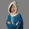 Close-up of a warm winter knitted Balaclava hood with a colorful speckled pattern on a model - Milkshake White