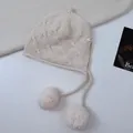 Handmade beige 100% wool knitted elf pumpkin hat with soft fluffy pom-poms for winter - One Size / Off White