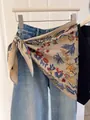 Vintage floral triangular silk scarf styled as a fashion waist accessory on jeans - Beige Flower