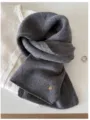Detailed texture of a soft grey 100% wool knit scarf with a small vintage metal charm - 144cm / Premium Grey