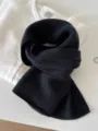 Detailed view of black 100% pure wool knitted scarf showing soft and warm texture - 144cm / Charcoal Gray