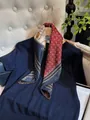 Detailed view of an elegant French retro silk scarf featuring vintage chain and paisley patterns - Square Scarf / Navy Red Stirrup Buckle (Chain Pattern)