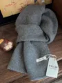Elegant grey 100% wool knitted scarf variant in minimalist solid color winter style - Mid-Length / Gray