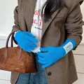 Vibrant blue lace-trimmed knitted long gloves for women to provide winter warmth - One Size / Blue