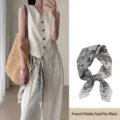 Close-up of French vintage paisley silk scarf styled as a waist accessory - Square Scarf / White Paisley