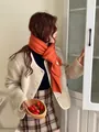 Vibrant orange chunky knit winter scarf for women styled with a warm fleece jacket - 160x20cm / Orange