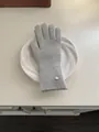Grey knitted wool gloves for women, warm winter accessory in elegant solid color. - Gloves - Grey