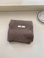 Premium soft brown ribbed knit wool scarf for winter with a minimalist brand label - Scarf - Coffee