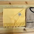 Premium 100% Australian wool scarf in soft yellow featuring elegant tassel fringes - Goose Yellow