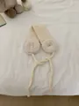 Elegant cream knitted plush earmuffs with adjustable tie straps for cozy winter warmth - One Size / Milky White