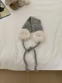 Warme grau-weiße gestrickte Winter-Ohrenschützer mit verstellbaren Bindebändern - Einheitsgröße / Grau