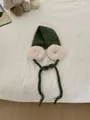 Cozy green knitted winter hat with oversized white plush ear warmers and tie straps - One Size / Green