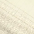 Macro view of cream checkered tweed fabric showing detailed woven texture for autumn fashion. - Beige (811-3)