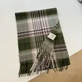 Detailed texture of 100% Australian wool scarf featuring green plaid and soft tassels - 32x180cm / Army Green Plaid