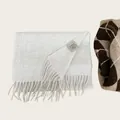Soft 100% Australian wool scarf in light gray with tassels and authentic care label - Oatmeal