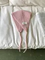 Sweet pink knitted wool-blend ear warmer with retro patch and tie-up design. - One Size / Pink