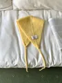 Cozy vintage knitted ear warmer with ties and retro fabric label in bright yellow - One Size / Yellow