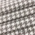 Close-up of brown and white herringbone weave linen cotton fabric for upholstery and sewing - Brown (8328-16)