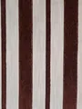 Close-up detail of mid-century style vertical stripe chenille upholstery fabric - Red Brown